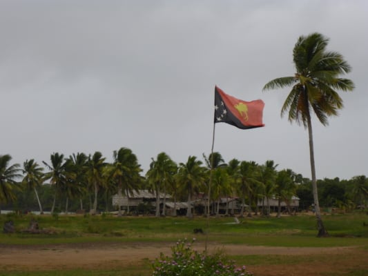 Flag of Papua New Guinea in South Fly, Papua New Guinea