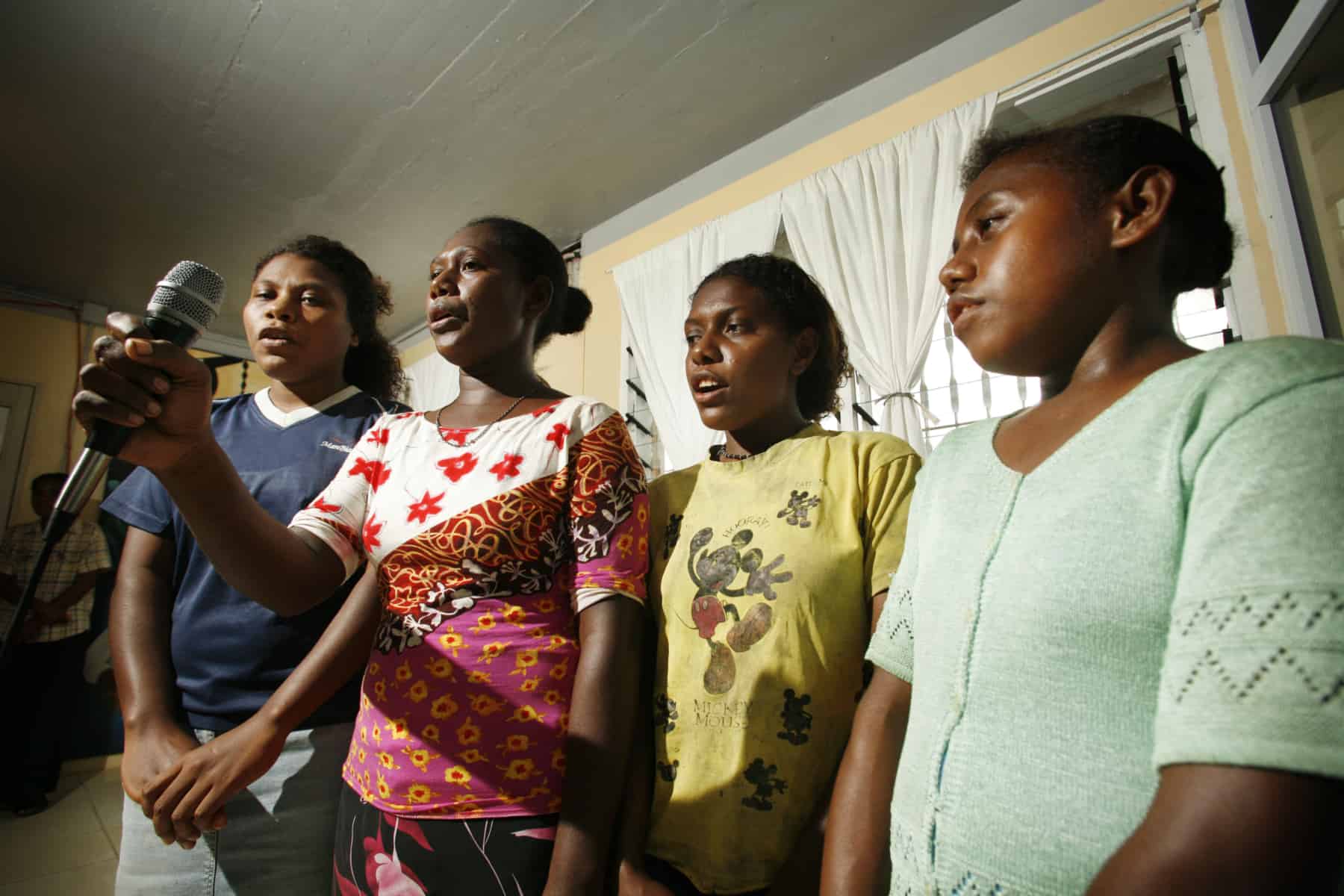 Four women leading a presentation