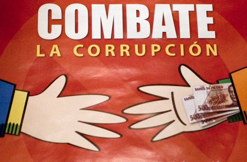 Two hands reaching out to each other, one with money stuffed up sleeve