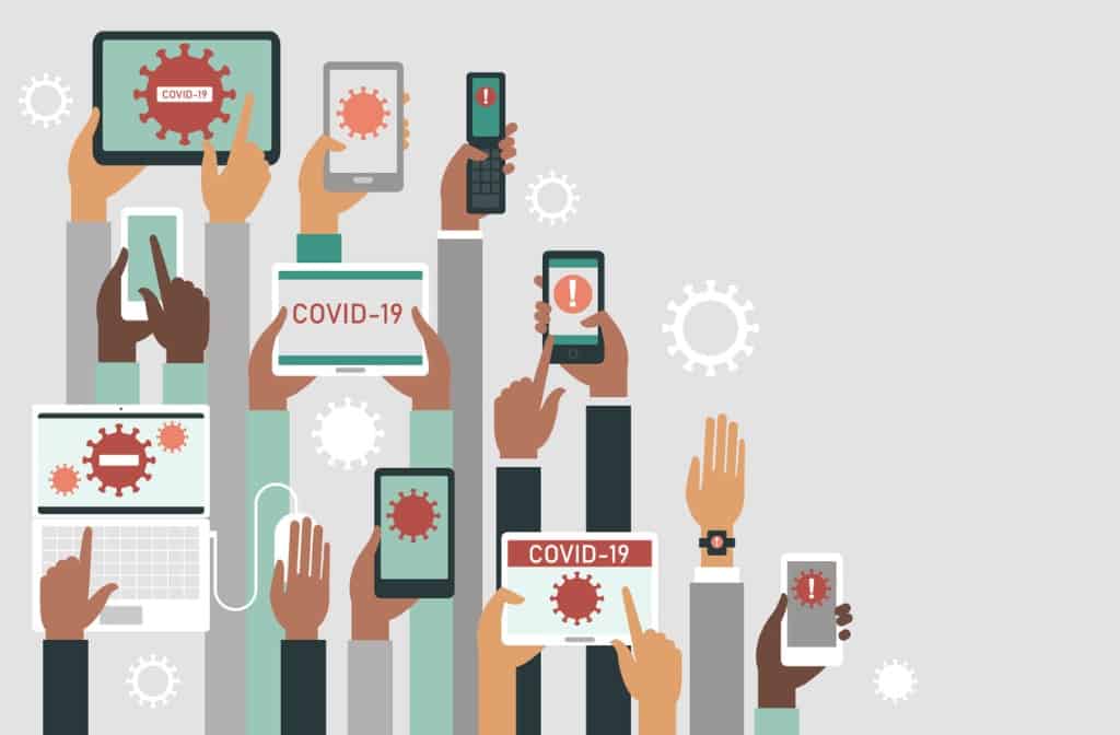 Hands holding signs and phones showing images of viruses, danger warnings and text saying COVID-19