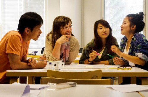 People at a table talking