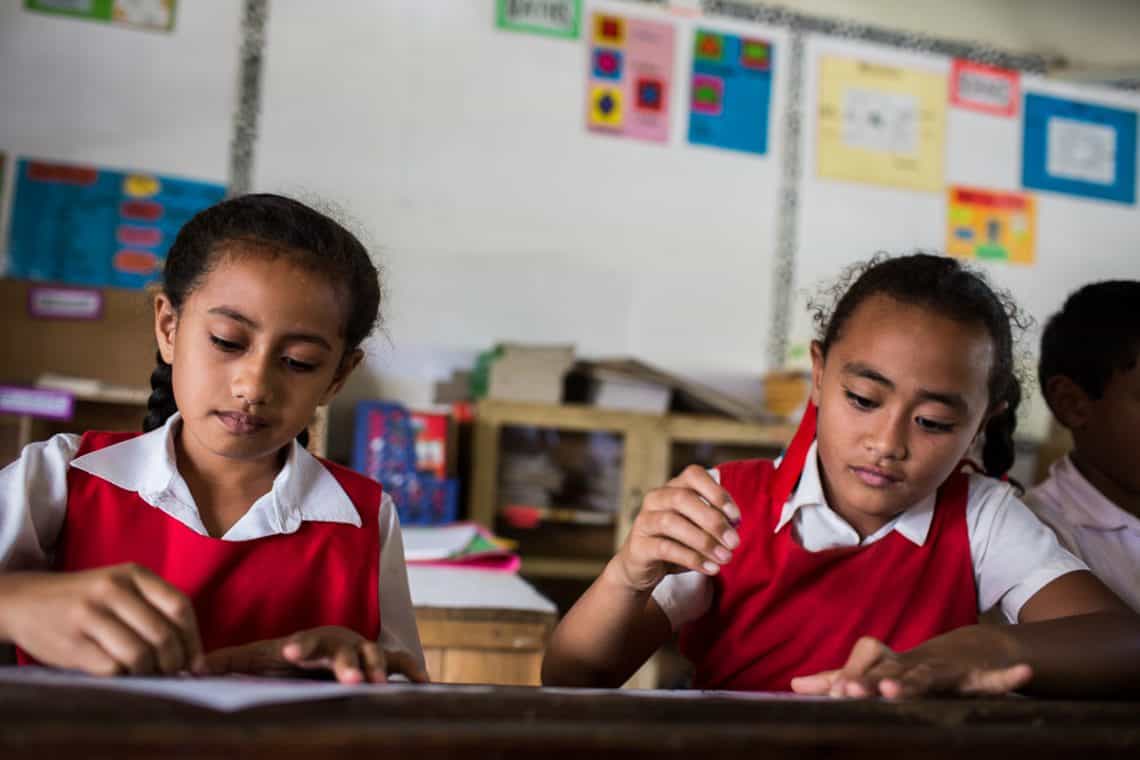 Two girls in a classroom