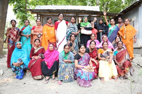 A group of women posing for a photo